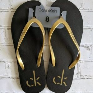 Calvin Klein Shoes - Calvin Klein Sarinah Gold Flip Flops Sandals Calvin Klein Shoes - Calvin Klein Sarinah Gold Flip Flops Sandals